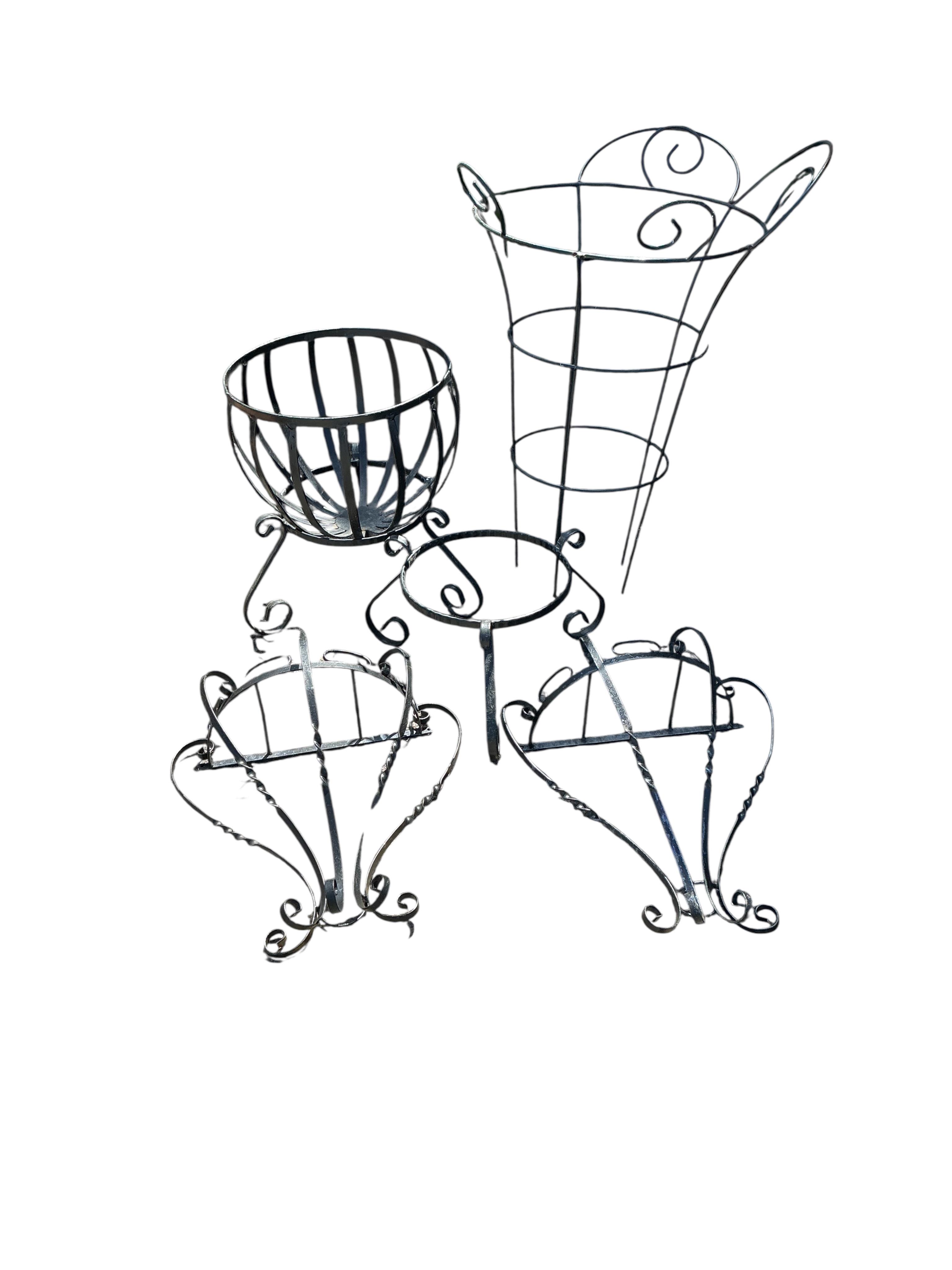 A wrought iron planter, growing frame and a pair of garden wall brackets